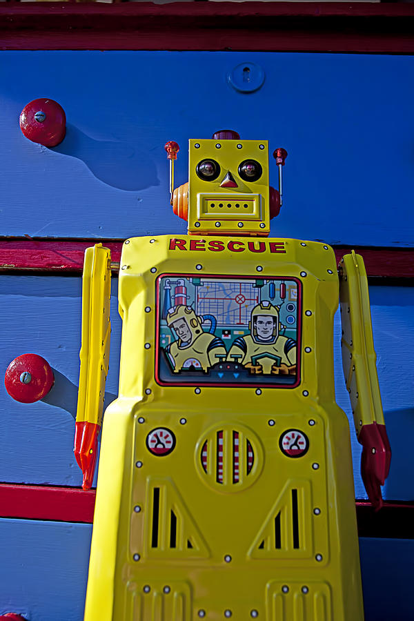 Toy Photograph - Yellow robot in front of drawers by Garry Gay