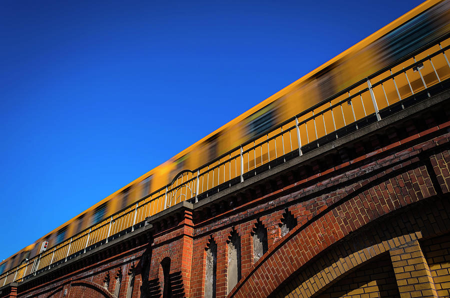 Yellow Subway Going Overground On A Photograph by Ingo Jezierski