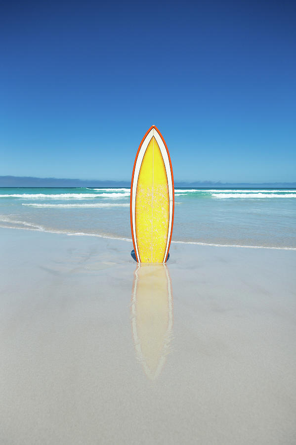 Yellow Surfboard On A Beach Photograph by John White Photos