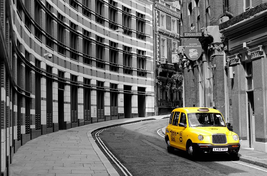 Yellow Taxi in London Photograph by Jim Hughes
