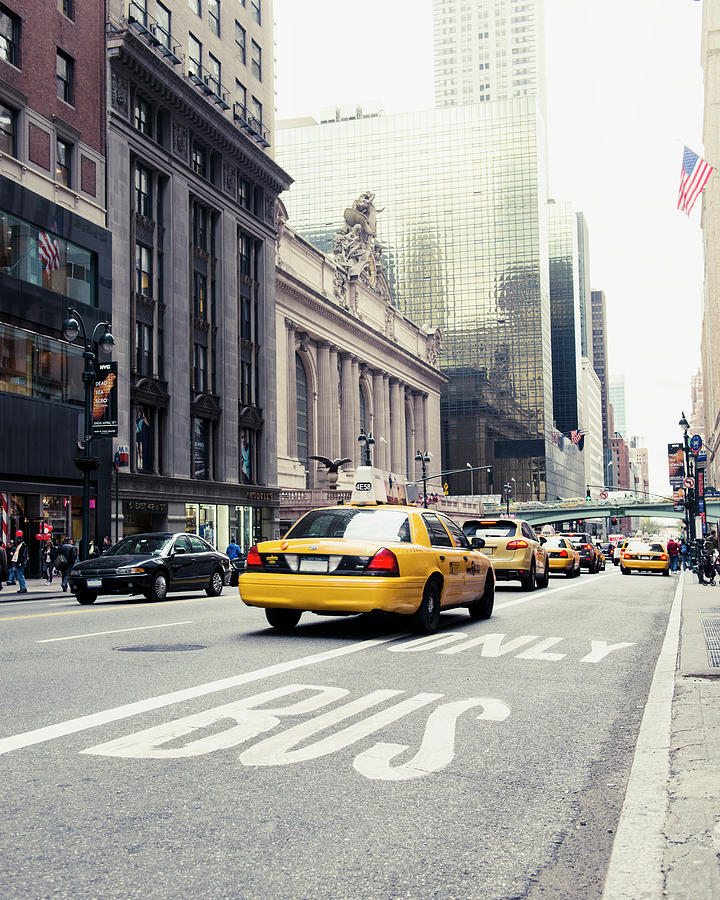 Yellow Taxi On Street Photograph by Johner Images