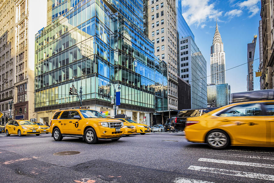 Yellow taxis on busy street in New York City Photograph by Xavierarnau