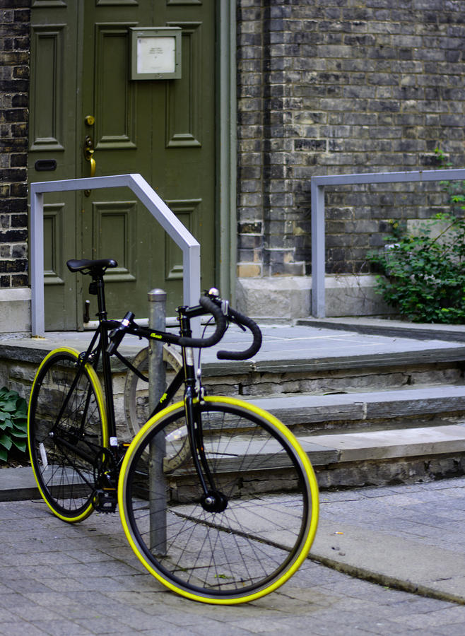 Transportation Photograph - Yellow wheeled bike by James Canning