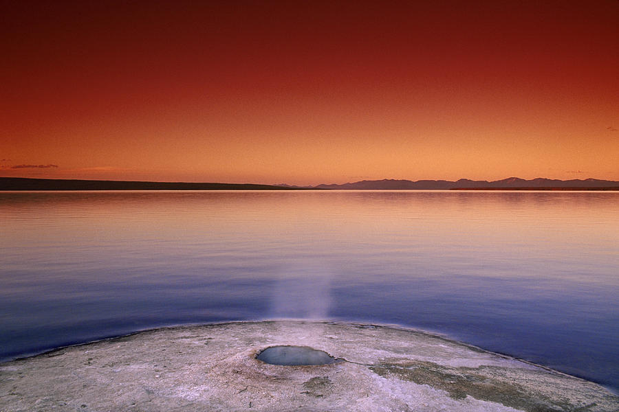 Yellowstone Lake and Geyser Photograph by Rich Franco