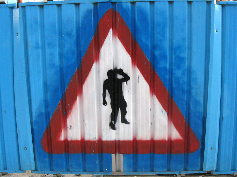 Yield to drunkards. Painted on construction fence in Leeds. Photograph by Rob Huntley