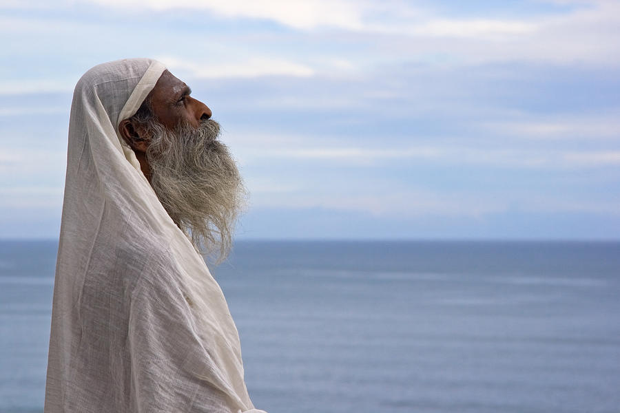 Yogi chanting while staring at the Sun. Photograph by Sonny Marcyan