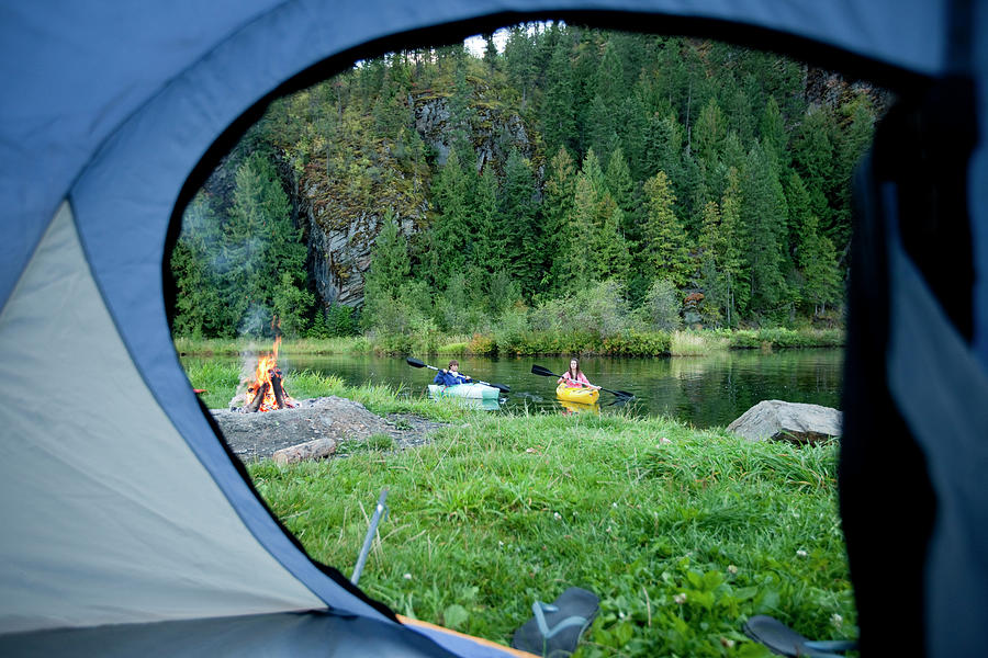 Sports Photograph - Young Adult Couple Camping With A Camp by Patrick Orton