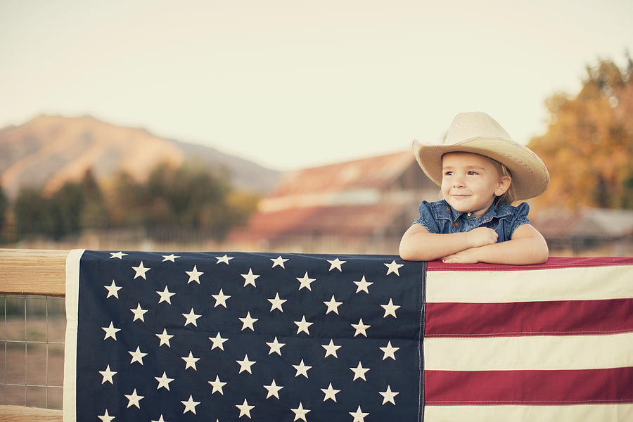 Young American Cowgirl with US Flag Photograph by RichVintage