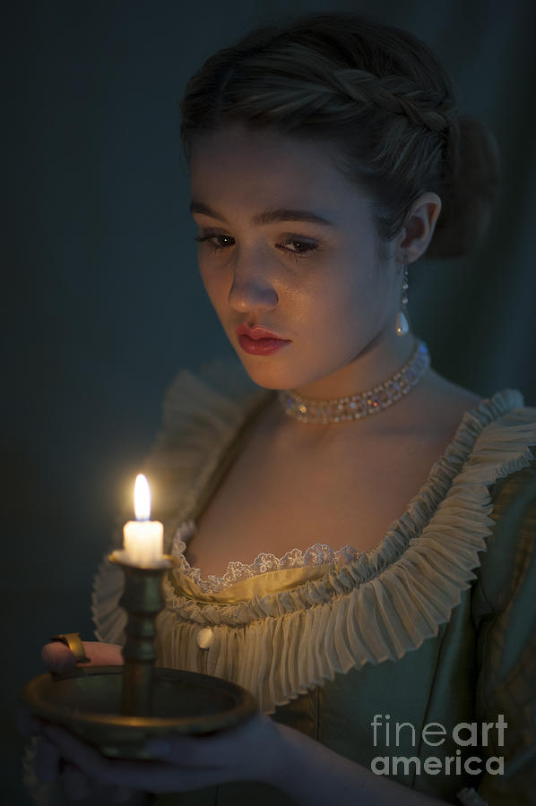 Young Beautiful Historic Woman Holding A Candle Photograph by Lee Avison