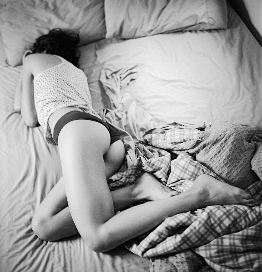 Young Beautiful Woman Sleeping Alone In Bed Photograph by Ioseph