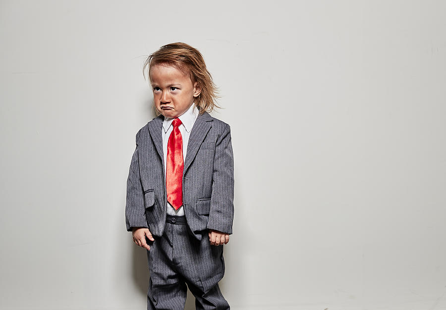 Young Boy Dressed Up As Donald Trump For Halloween Photograph by Ballyscanlon