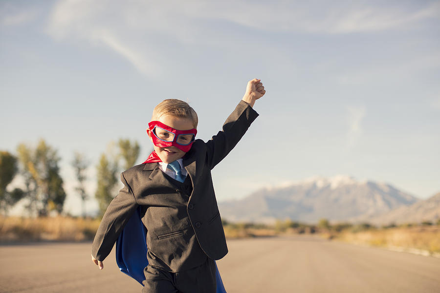 Young Boy in Superhero Costume and Business Suit is Running Photograph by RichVintage