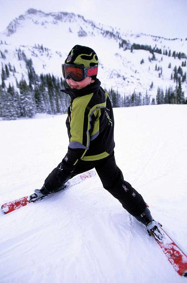 Winter Photograph - Young Boy Skiing In Alta, Utah by Scott Markewitz