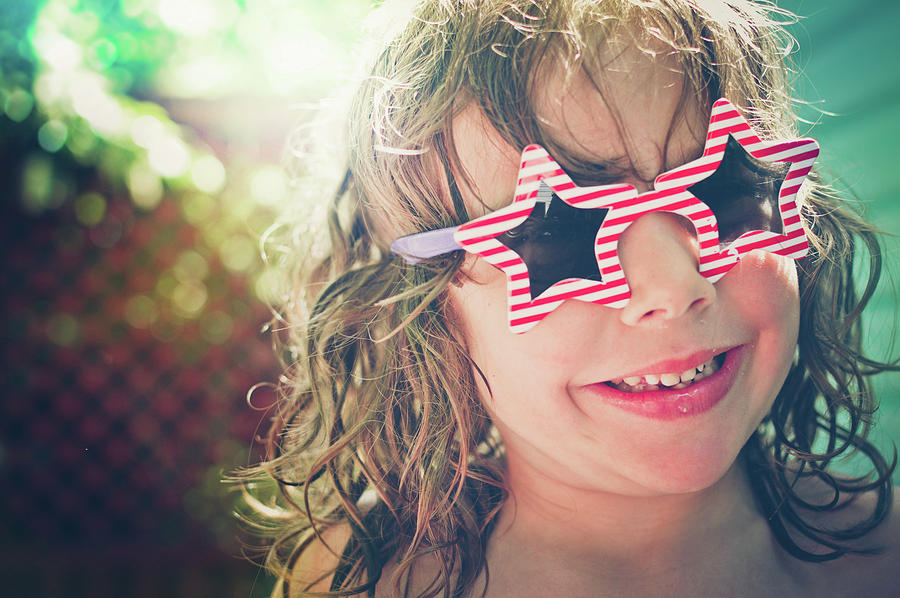 Young Boy Wearing Patriotic Sunglasses Photograph by Fran Polito