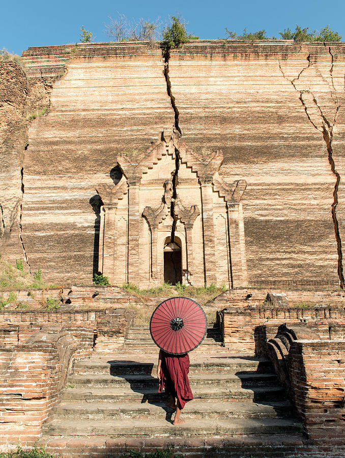 Young Buddhist Monk Walking Towards Photograph by Martin Puddy