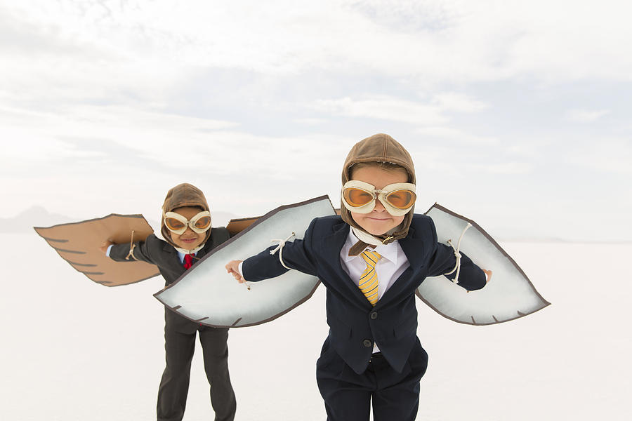 Young Business Boys Wearing Cardboard Wings Photograph by RichVintage