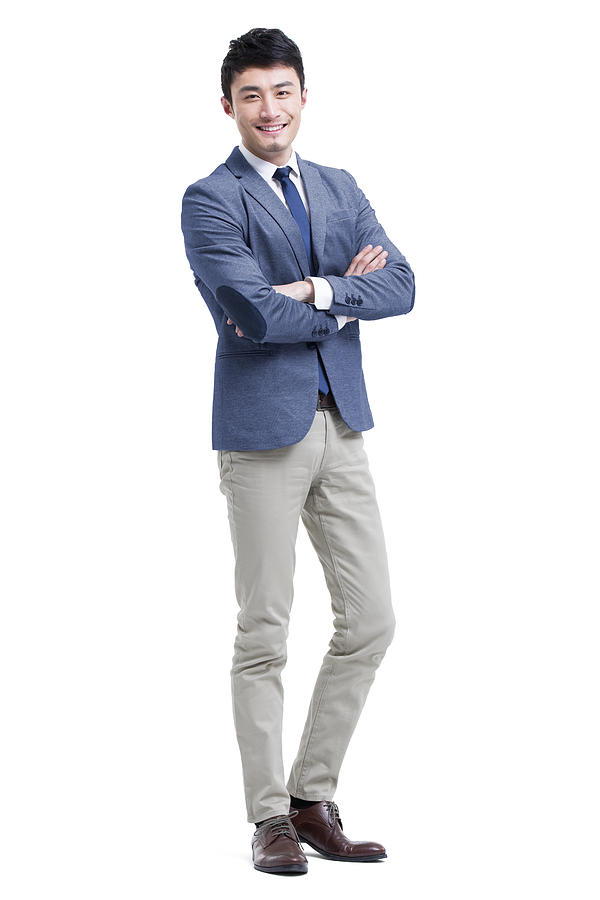 Young businessman arms crossed Photograph by Bji