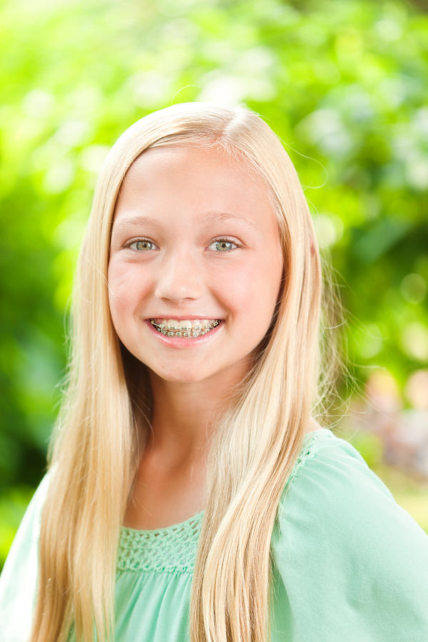 Young Caucasian Teen Girl Portrait with Dental Teeth Braces Photograph by YinYang