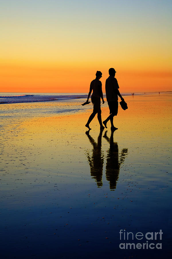 Young Couple on Romantic Beach at Sunset Photograph by Colin and Linda McKie