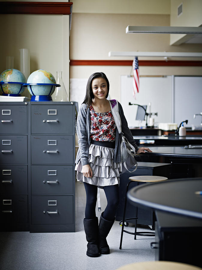 Young female student in science lab classroom Photograph by Thomas Barwick