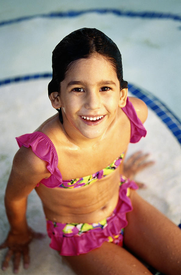 Young Girl In Swimming Pool Photograph by Juan Silva