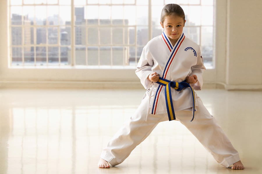 Young girl Karate pose Photograph by Jose Luis Pelaez