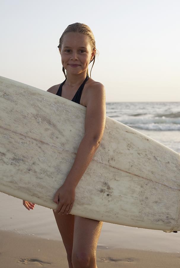 Beach Photograph - Young Girl With Surfboard by Ben Welsh
