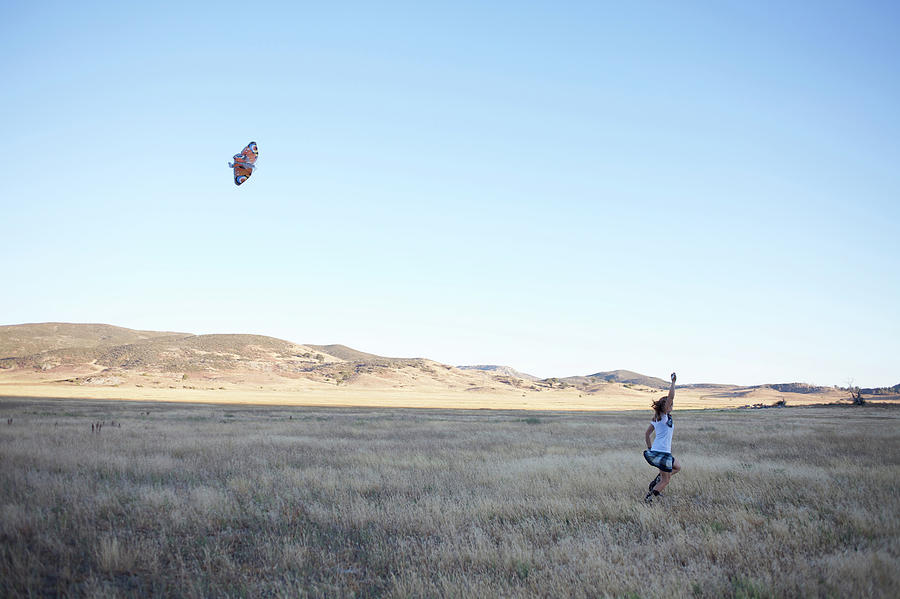 Rural Scene Photograph - Young Lady Flies A Kite In An Open by Priscilla Gragg