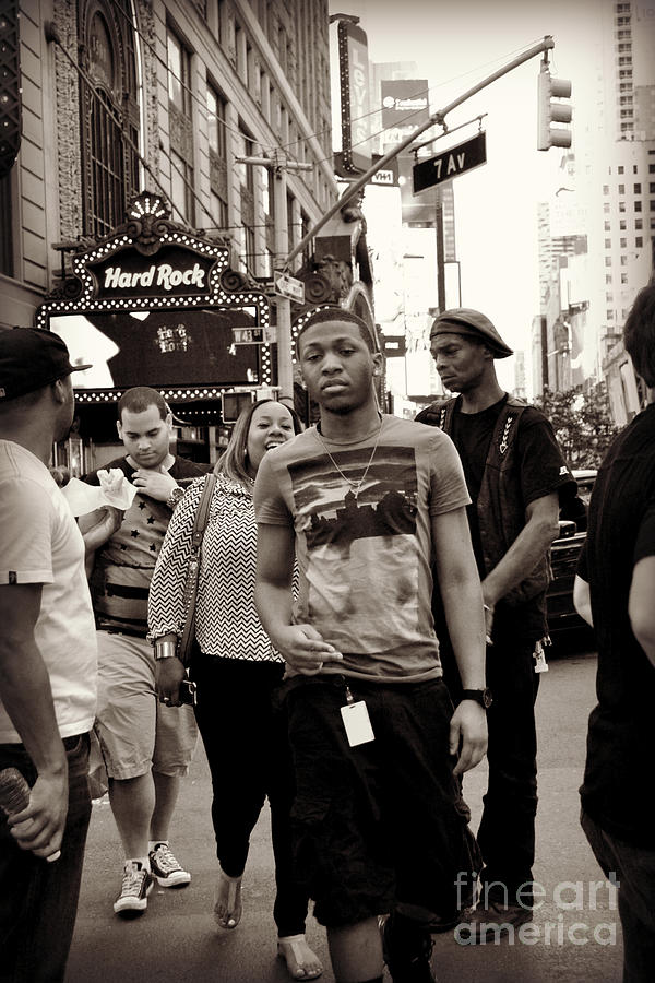 Black And White Photograph - Young Man and Guy with Cap - Times Square by Miriam Danar