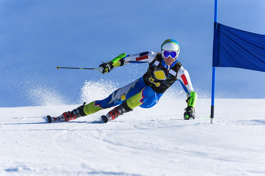 Young Man Compeeting at Giant Slalom Race Photograph by Technotr