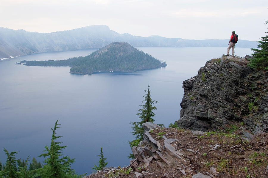 Mountain Photograph - Young Man Hiking At Crater Lake by Justin Bailie