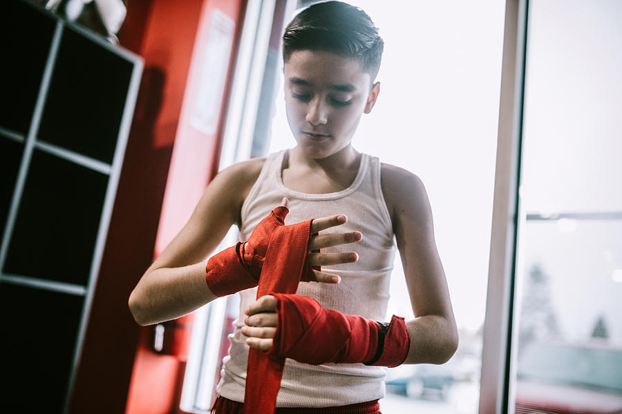 Young Man In Kickboxing Training Center Photograph by RyanJLane