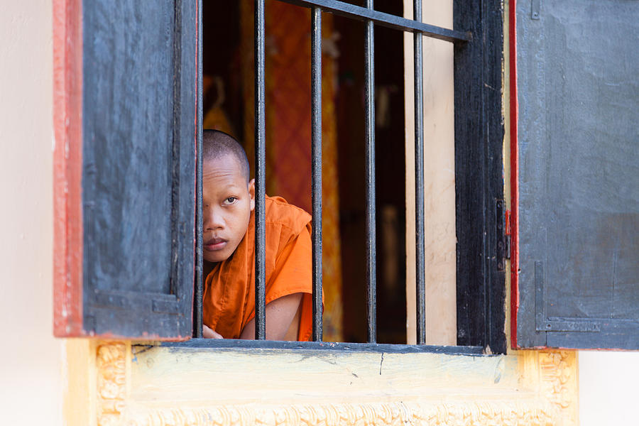 Young monk Photograph by Alexey Stiop