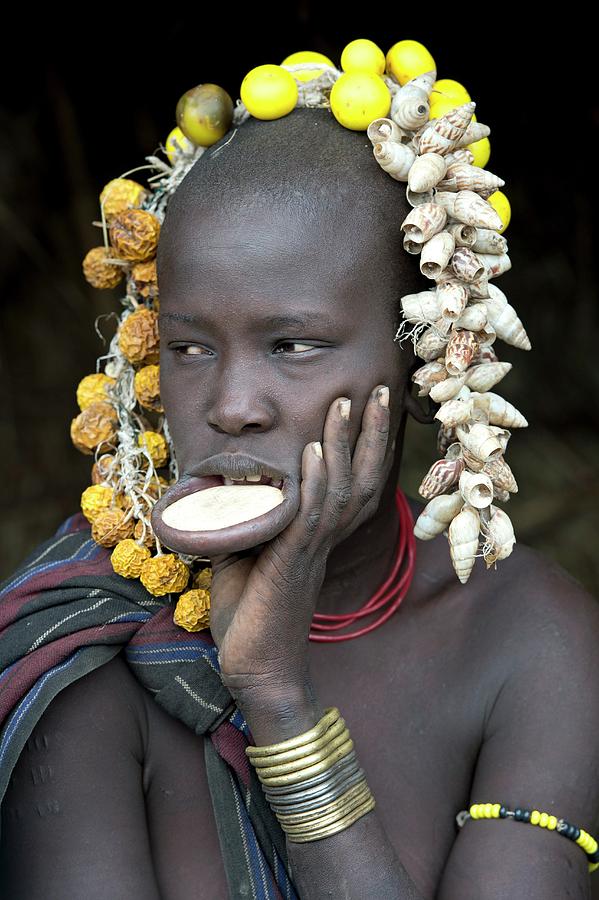 Young Mursi Girl With Lip Plate Inserted Photograph by Tony Camacho