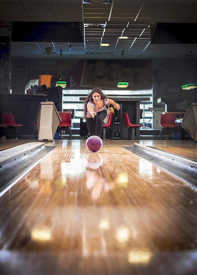 Young woman at bowling Photograph by PJPhoto69