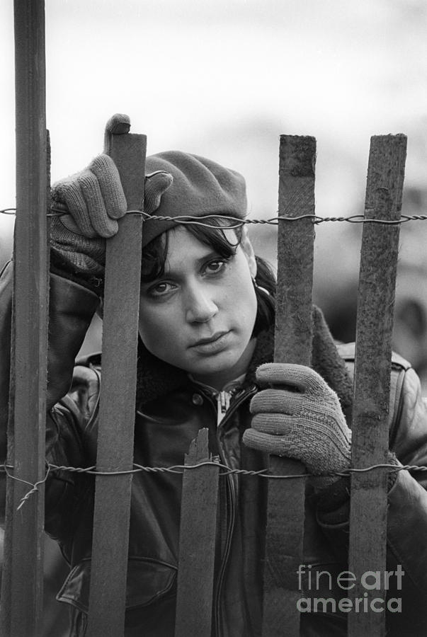 Young Woman Behind Fence Photograph by Jim West