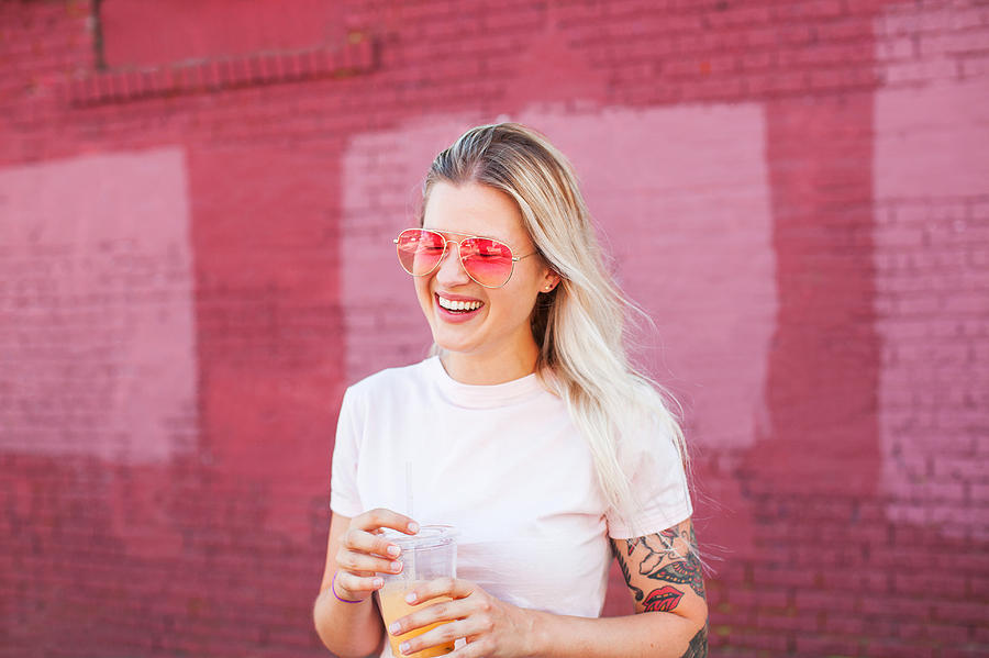 Young woman drinking juice Photograph by Stephen Zeigler Young woman drinking juice Photograph by Stephen Zeigler