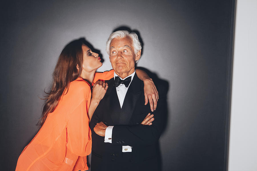 Young woman embracing elegant senior man Photograph by Westend61