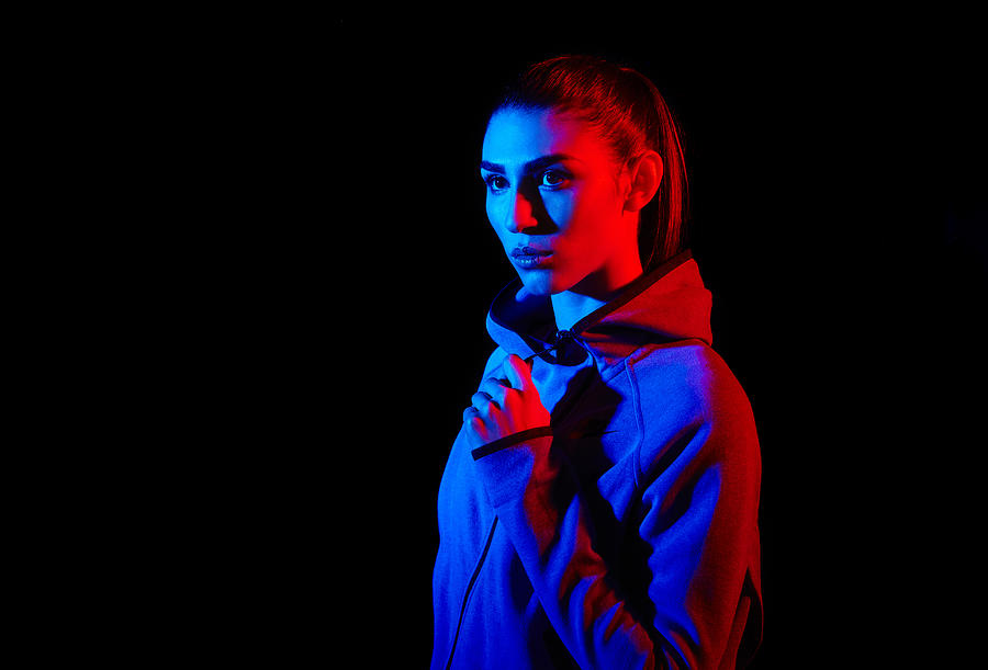 Young Woman Photographed With Creative Lighting Photograph by Mads Perch