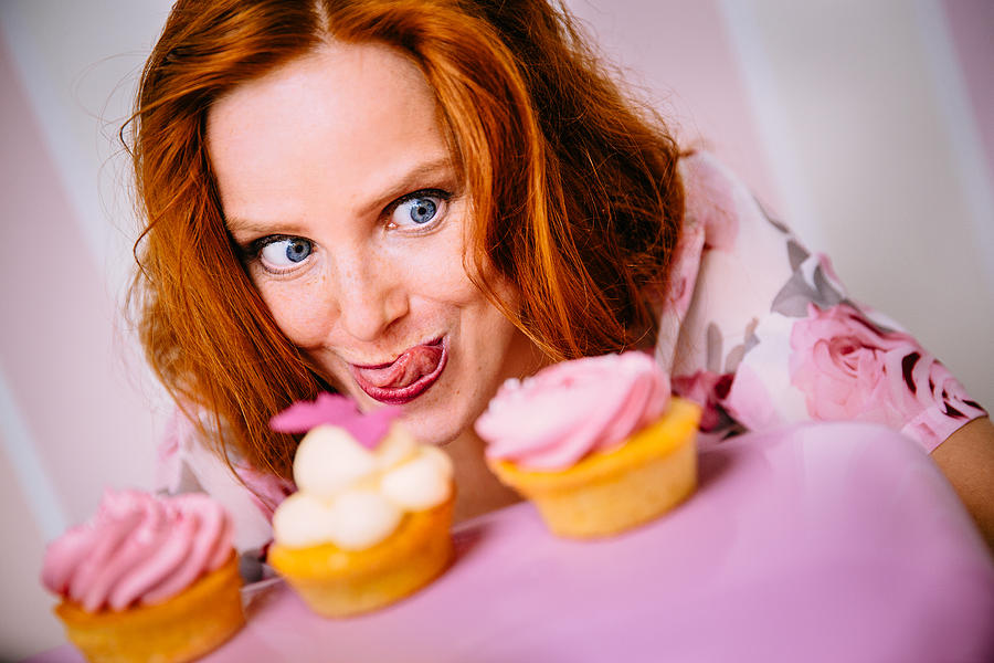 Young Woman Really Wants To Eat Cupcakes Photograph by Wundervisuals