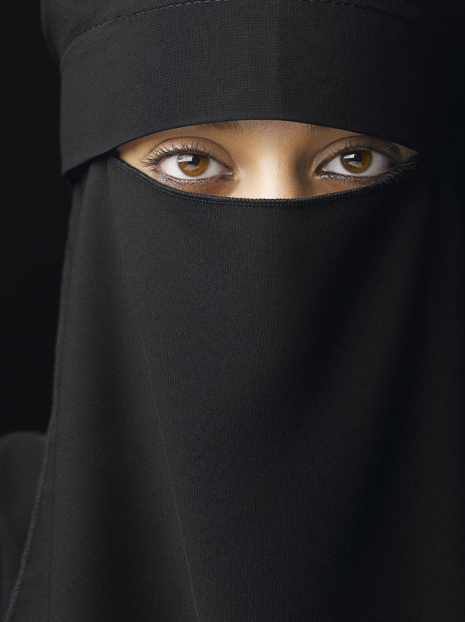 Young woman wearing hijab, close-up, portrait Photograph by Peter Dazeley