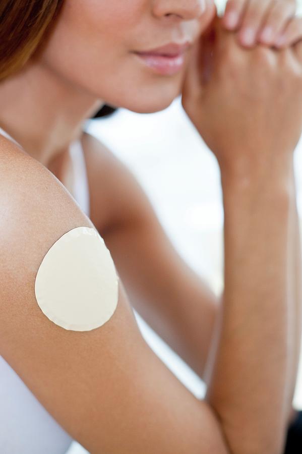 Young Woman Wearing Nicotine Patch Photograph by Science Photo Library
