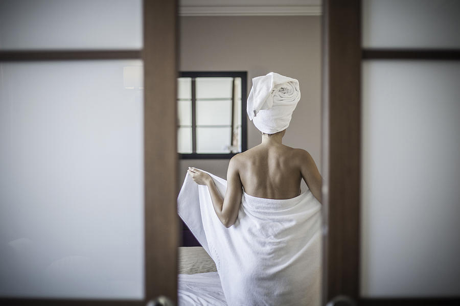Young woman wearing towel Photograph by Roberto Peri