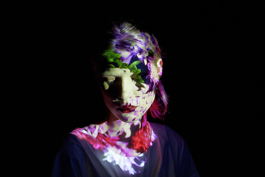 Young Woman With Flowers Projected On Photograph by Mads Perch