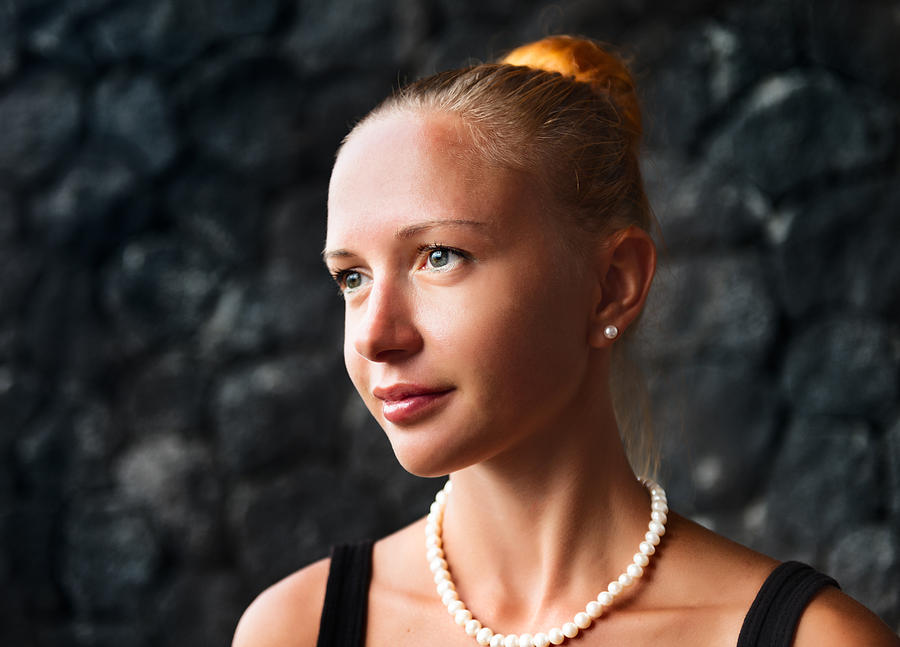 Young Woman With Pearl Necklace And Earrings Photograph