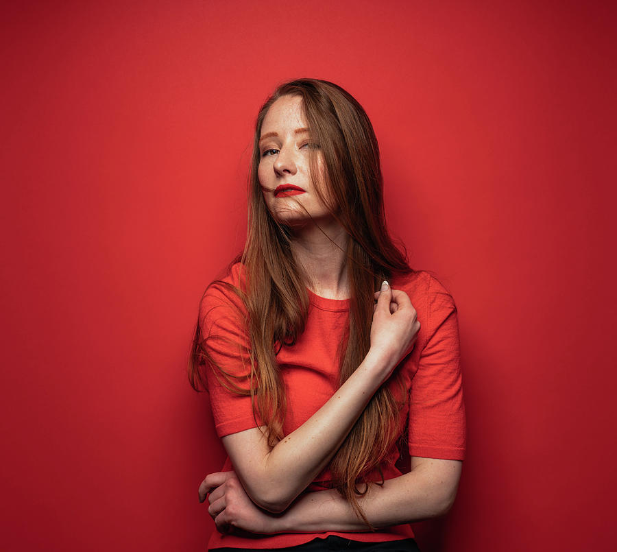 Young Woman With Red Hair On Red Photograph by Ian Ross Pettigrew