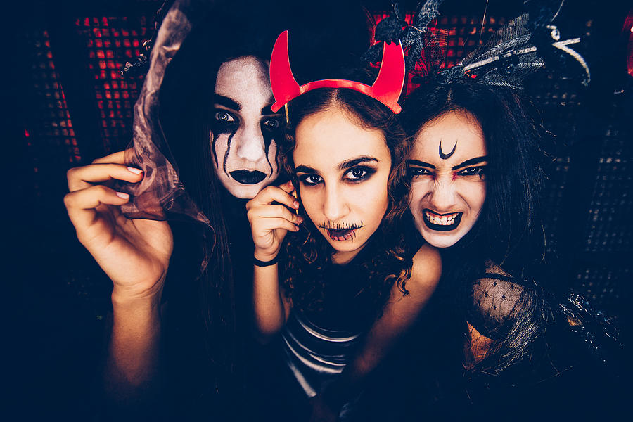 Young women with Halloween make-up and costumes Photograph by Wundervisuals