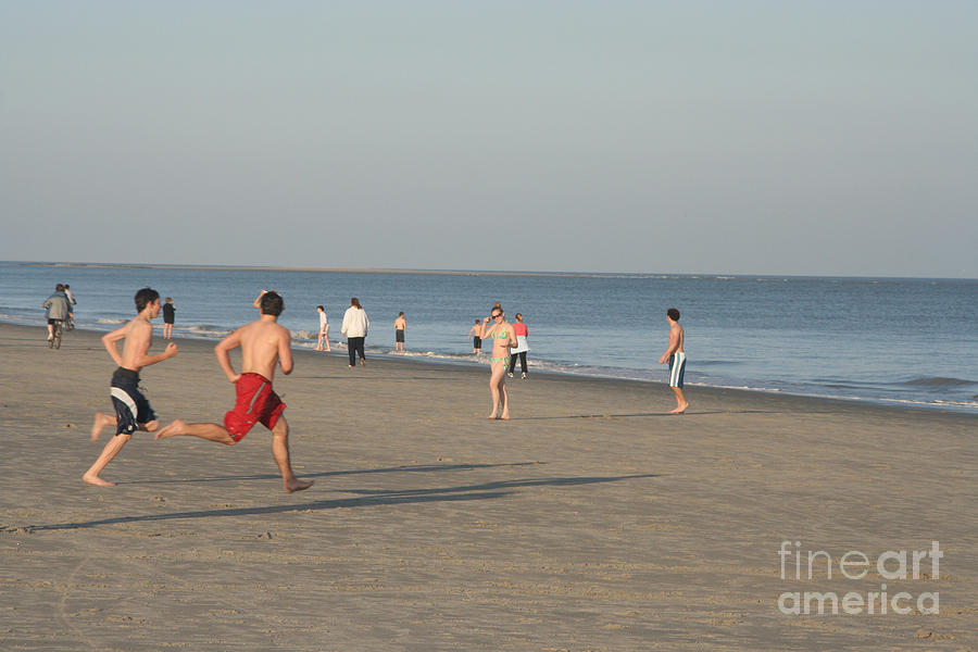 Youth Playing on the Beach at Hilton Head South Carolina Photograph by Thomas Marchessault