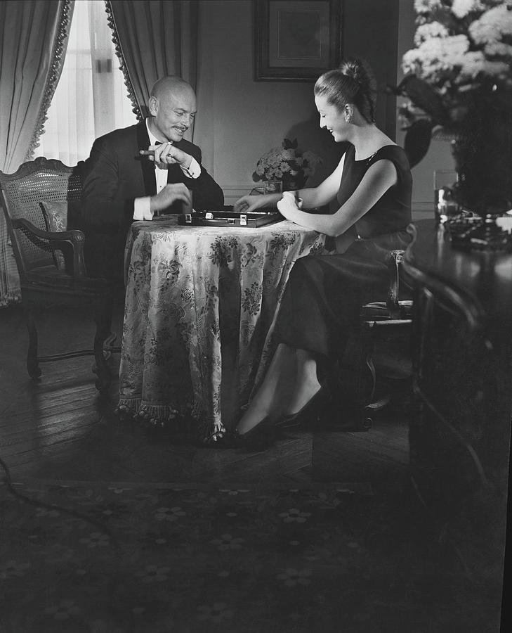 Yul Brynner Playing Backgammon With His Wife Photograph by Horst P. Horst