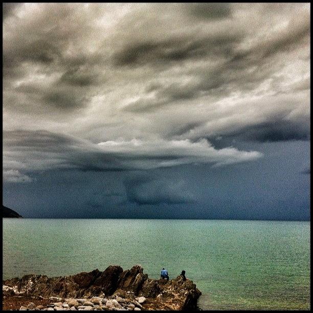Australia Photograph - ... Storms Over The Coral Sea by Brian Cassey
